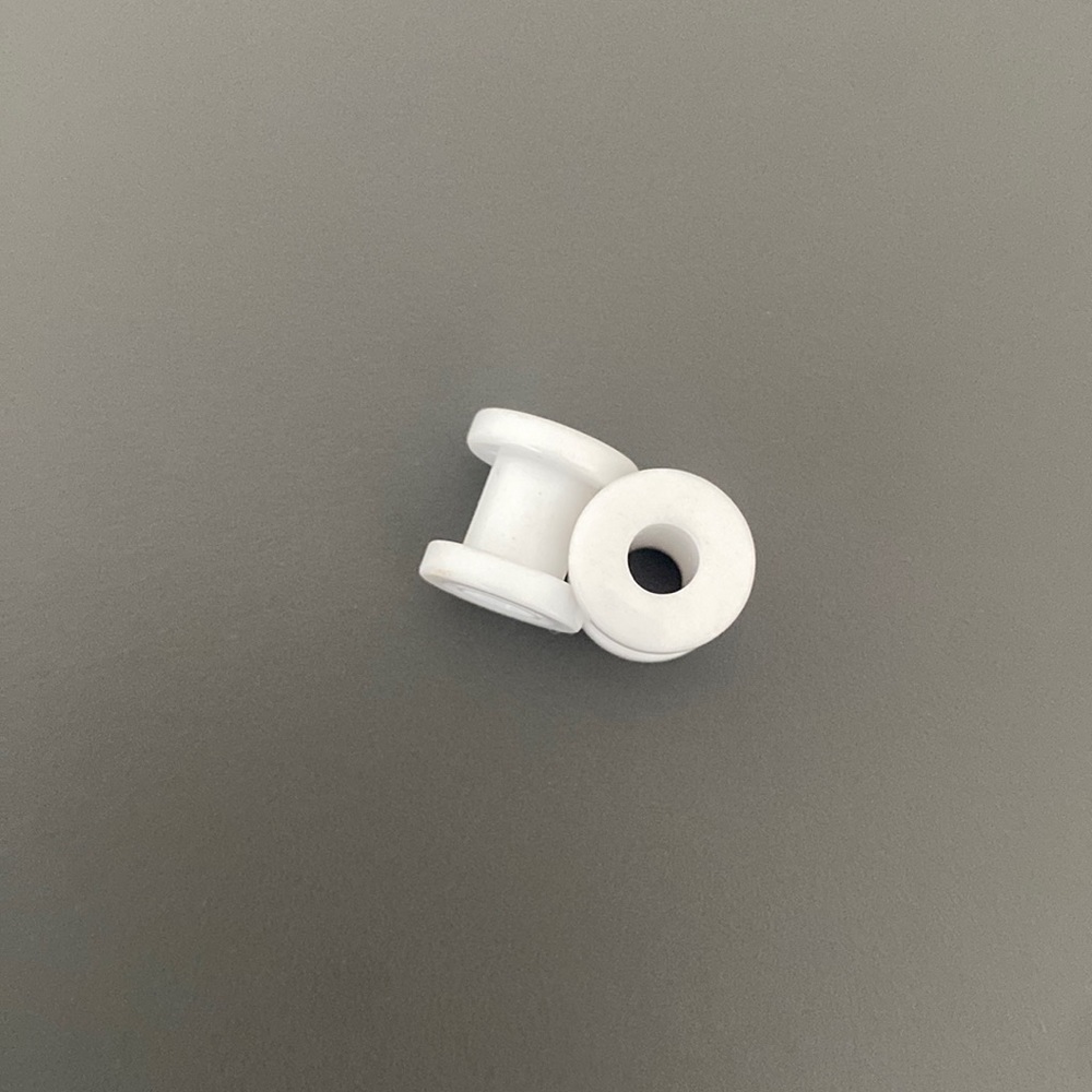 White plastic plugs.